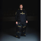 Unihoc Målvaktsbyxa ALPHA Evolab Black/Gold-Innebandy24